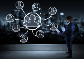 Poster - Businessman watching social network sketch on a rooftop 3D rendering