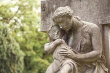 Young Mother With Little Child Monument On A Tomb At A Graveyard In Budapest, Hungary