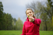 © Елена Кравчук - Natural background, bright woman holding green grass in hand, focus on grass
