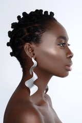 Wall Mural - Beautiful black girl with big earrings