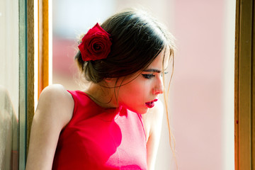 Wall Mural - spanish woman with makeup and red lips, rose in hair