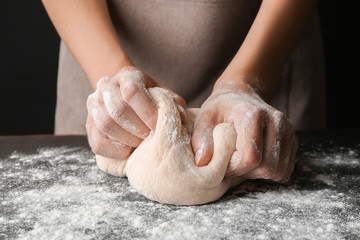 Canvas Print - Female hands making dough for pizza