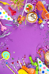 Wall Mural - Flat lay. Festive objects on purple background