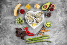 Different Aphrodisiac Food For Increasing Sexual Desire On Gray Table