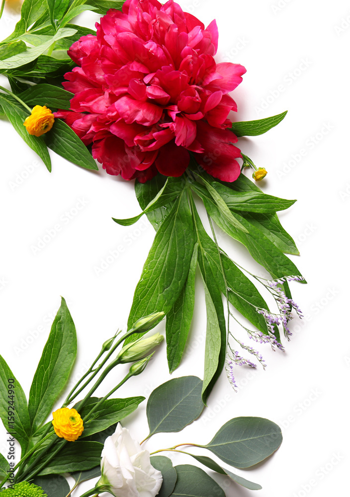 Composition of different flowers on white background