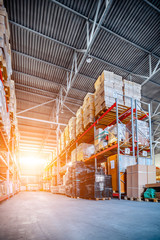 Long shelves with a variety of boxes and containers.