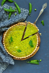 Wall Mural - Homemade tart with green peas, bacon and cheese.