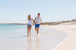 © Sergey Nivens - Romantic young couple on the beach