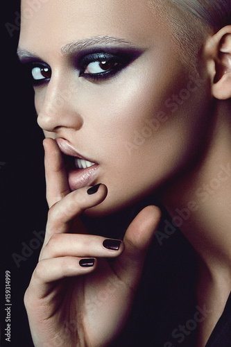 Blond Girl In A Rock Style With Makeup Smoky Ice In The