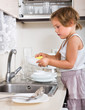 © JackF - Baby girl washing dishes