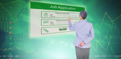Poster - Composite image of businesswoman pointing