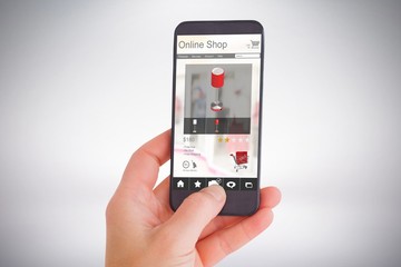 Poster - Composite image of female hand holding a smartphone