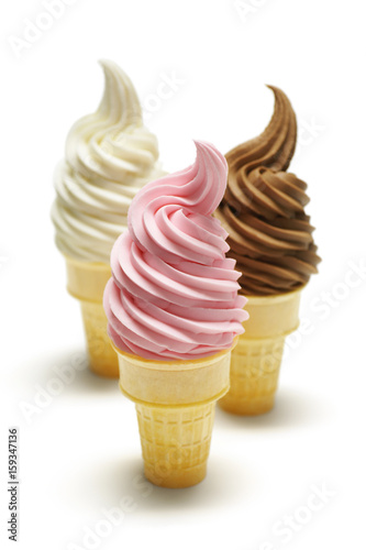 Fotografie, Obraz Three Flavors of Soft Serve Ice Cream or Frozen Yogurt in Cones