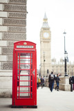 Fototapeta Big Ben - red telephone cabin in London city, Big Ben in background