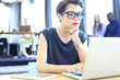 © opolja - Hipster Woman use Laptop huge Loft Studio.Student Researching Process Work.Young Business Team Working Creative Startup modern Office.Analyze market stock,new strategy.Blurred,film effect.