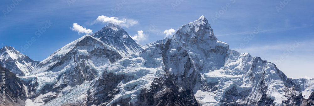 Mt Everest and Nuptse. Blue sky. Panoramic view. Himalayan mountains, Nepal. - obrazy, fototapety, plakaty 