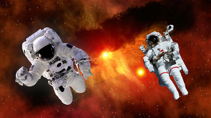 Wall Mural - two astronaut planet spaceman suit outer space gravity galaxy floating universe explosion. elements 