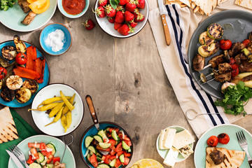 Canvas Print - Shish kebab, grilled vegetables, salad, snacks and strawberries