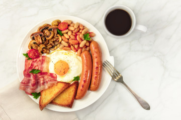 Wall Mural - English breakfast with coffee, fork, and copyspace