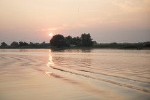 Breathtaking Sunset In Danube Delta, Romania, In A Summer Day