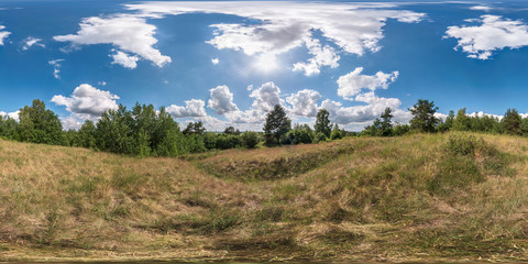 Wall Mural - full 360 degree seamless panorama in equirectangular spherical equidistant projection. Panorama view  in a field in beautiful day with nice clouds. Skybox as background for virtual reality content