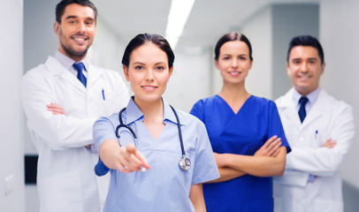 Poster - group of medics pointing finger on you at hospital