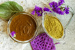 Prepare the henna paste at home. Focus on the powder.