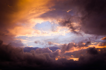 Wall Mural - Storm clouds in the sunset light