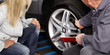 © Karin & Uwe Annas - Motormechanic explaining repair costs
