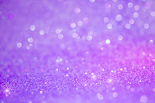 Bright And Abstract Blurred Purple Bokeh Background With Shimmering Glitter