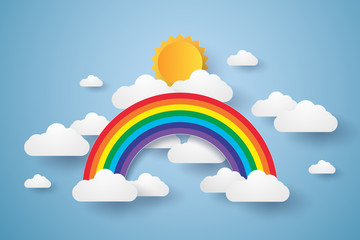 Wall Mural - blue sky with rainbow and cloud , paper art style