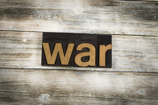 War Letterpress Word on Wooden Background
