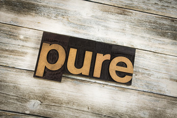 Wall Mural - Pure Letterpress Word on Wooden Background