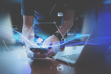 Poster - businessman hand working with mobile smart phone in modern office with virtual icon diagram