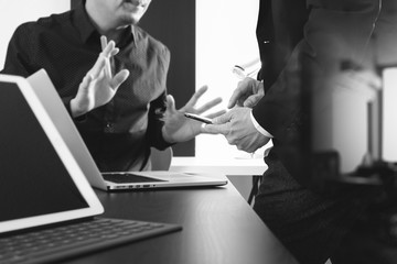 co working team meeting concept,businessman using smart phone and digital tablet and laptop computer in modern office