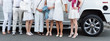 © Magryt - People dressed in white posing next to limousine. Body parts, white party