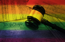 Rainbow Flag Gavel On America's Constitution
