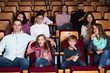 © JackF - People eating popcorn in cinema