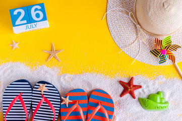 July 26th. Image of july 26 calendar with summer beach accessories and traveler outfit on background. Summer day, Vacation concept