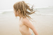 © Jamie Grill Photography/Tetra Images - USA, New York, Monatuk, Girl (2-3) running on beach by ocean