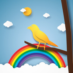 Wall Mural - Bird on branch with rainbow and cloud , paper art style