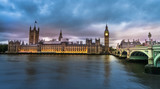 Fototapeta Londyn - View of the Houses of Parliament and Westminster Bridge in London at sunset