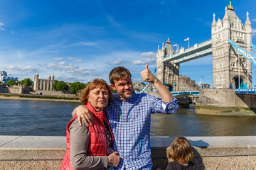 Adult son with his aged mother in London, UK