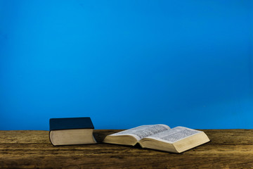 Bible on the old table. Beautiful background