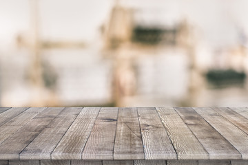 Wall Mural - wooden tabletop perspective for product placement or montage with focus to table. wooden board surfa