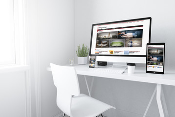 Poster - devices on white minimal workspace responsive emagazine website