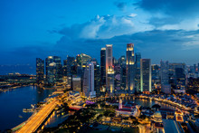 Singapore Business District Skyline In Night At Marina Bay, Singapore.