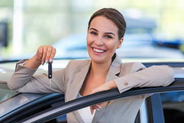 Wall Mural - Happy young man with her new car
