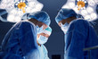 © Syda Productions - group of surgeons in operating room at hospital