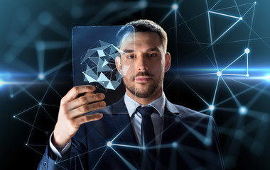 businessman working with transparent tablet pc